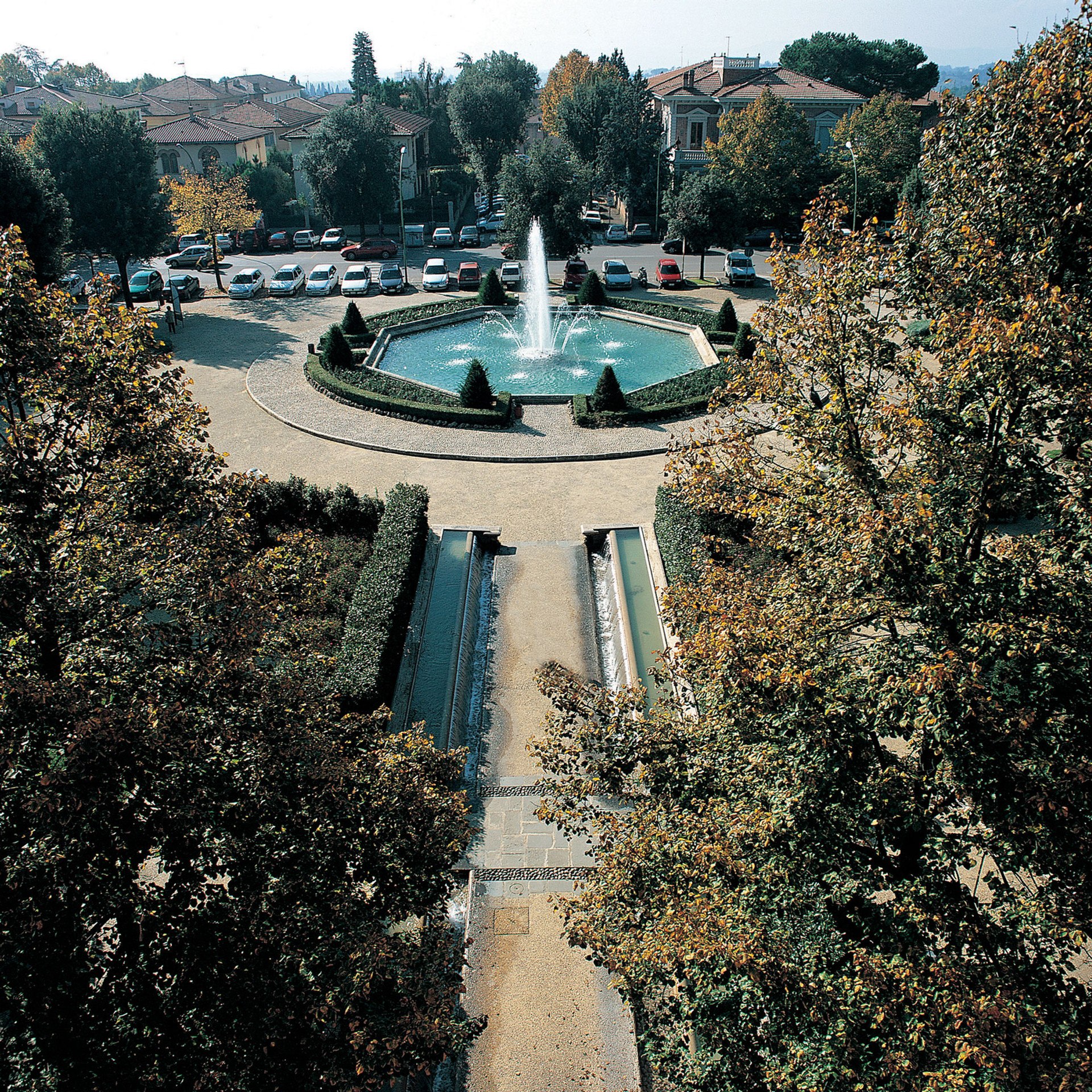 Aerial view of formal garden with octagonal fountain and symmetrical water channels